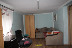powiększ