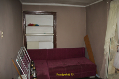 powiększ