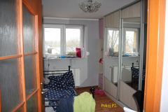 powiększ
