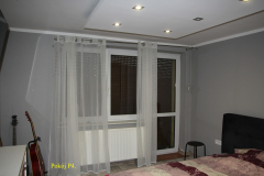 powiększ