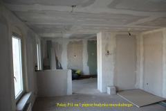 powiększ