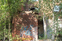 powiększ