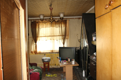 powiększ