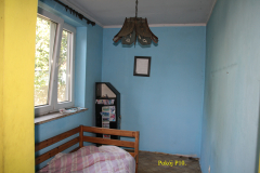 powiększ